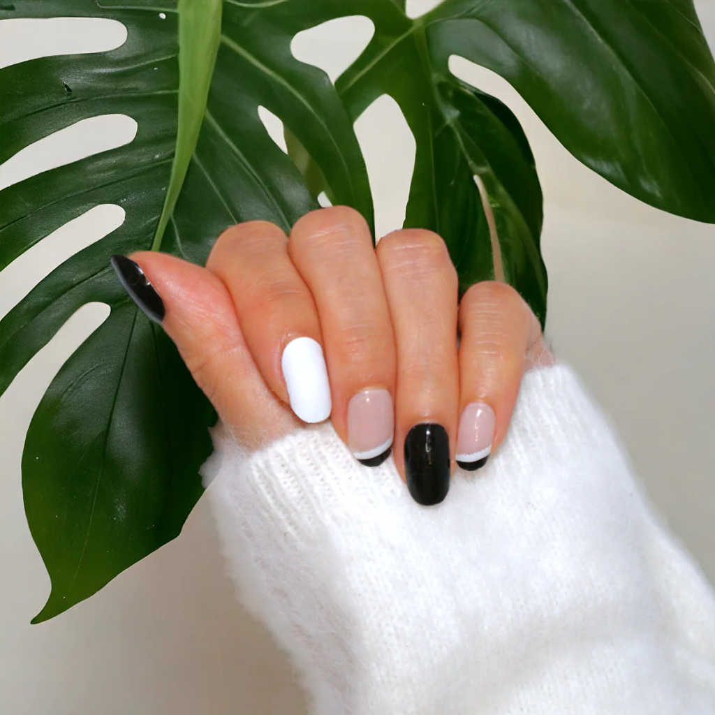 Alternating black and white nails